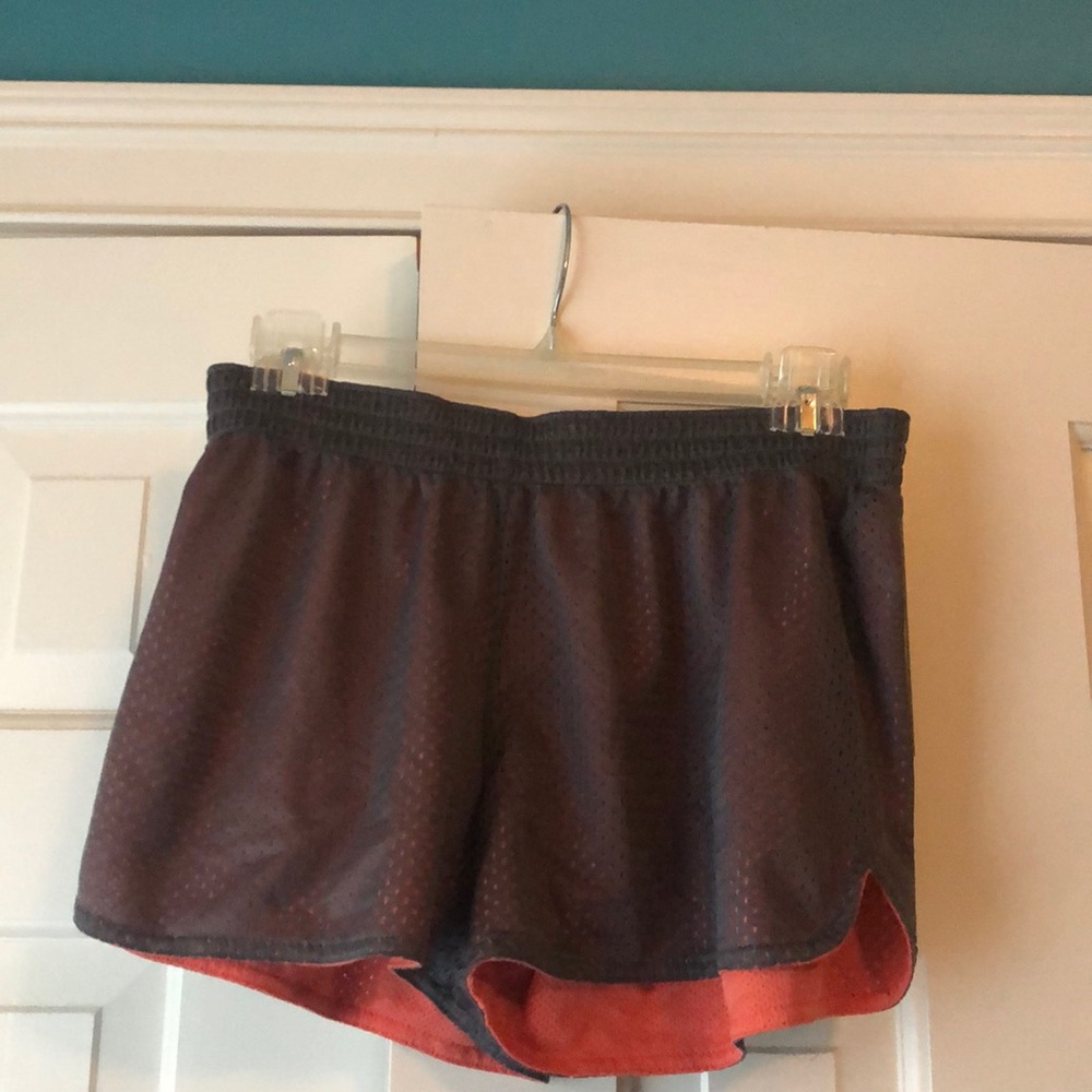 Reversible pink and grey athletic shorts